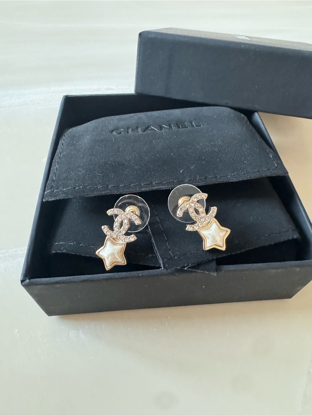 CHANEL Gold-Tone Crystal CC Earrings with White Star Drops